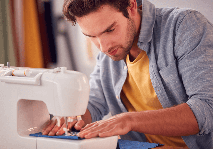 Man learning to sew with piping cord