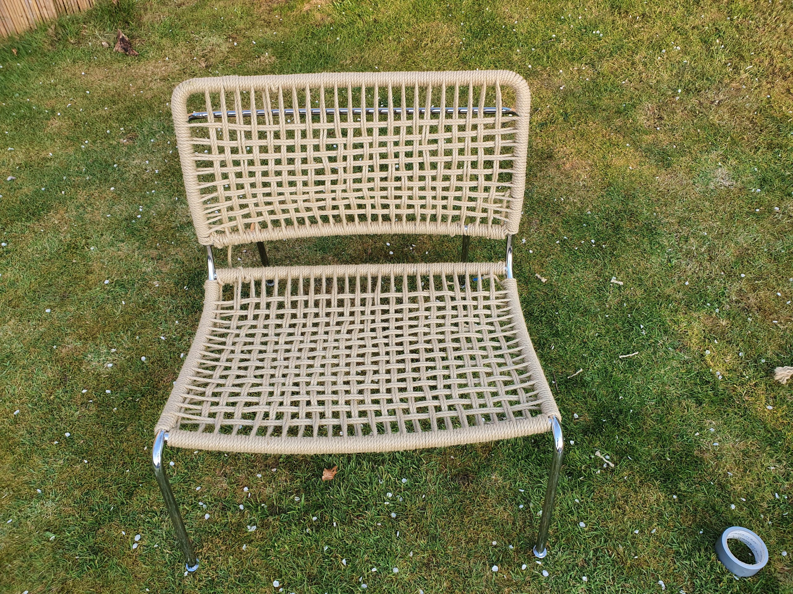weaving a new seat to an old garden chair