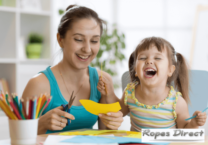 Mother and child doing rope crafts for kids
