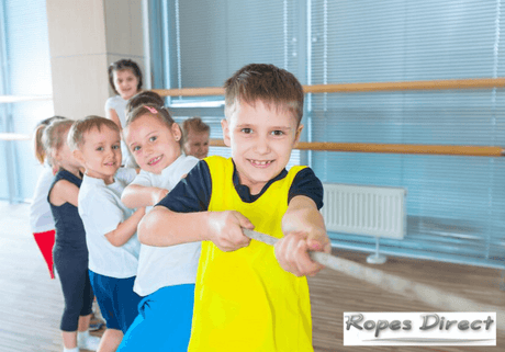 children playing with tug of war rope