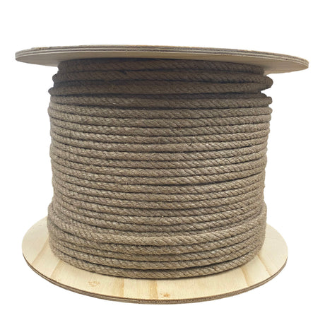 A spool of jute rope on a wooden reel on a white background.
