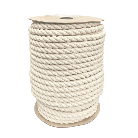 spool of 24mm natural cotton rope on a cardboard reel on a white backgound.
