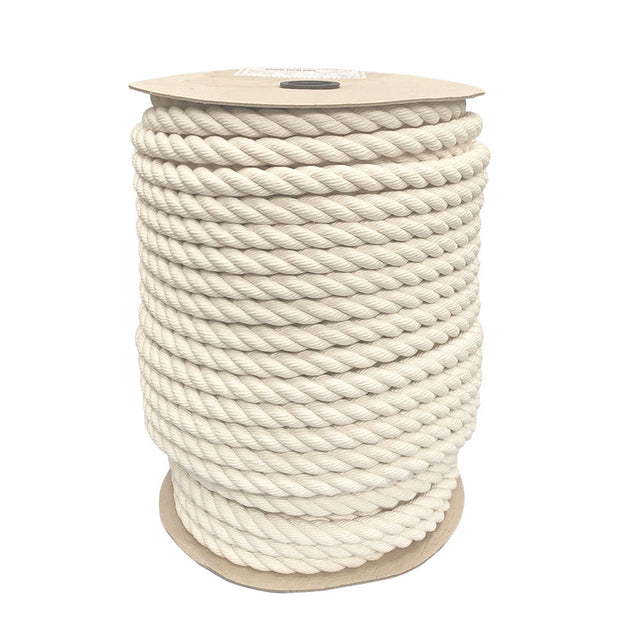 spool of 24mm natural cotton rope on a cardboard reel on a white backgound.