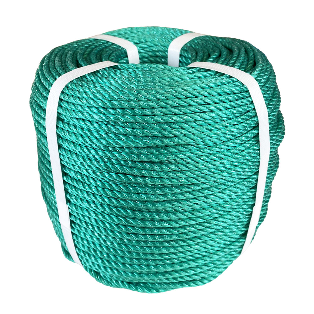 Coil of green polypropylene rope with white banding on a white background