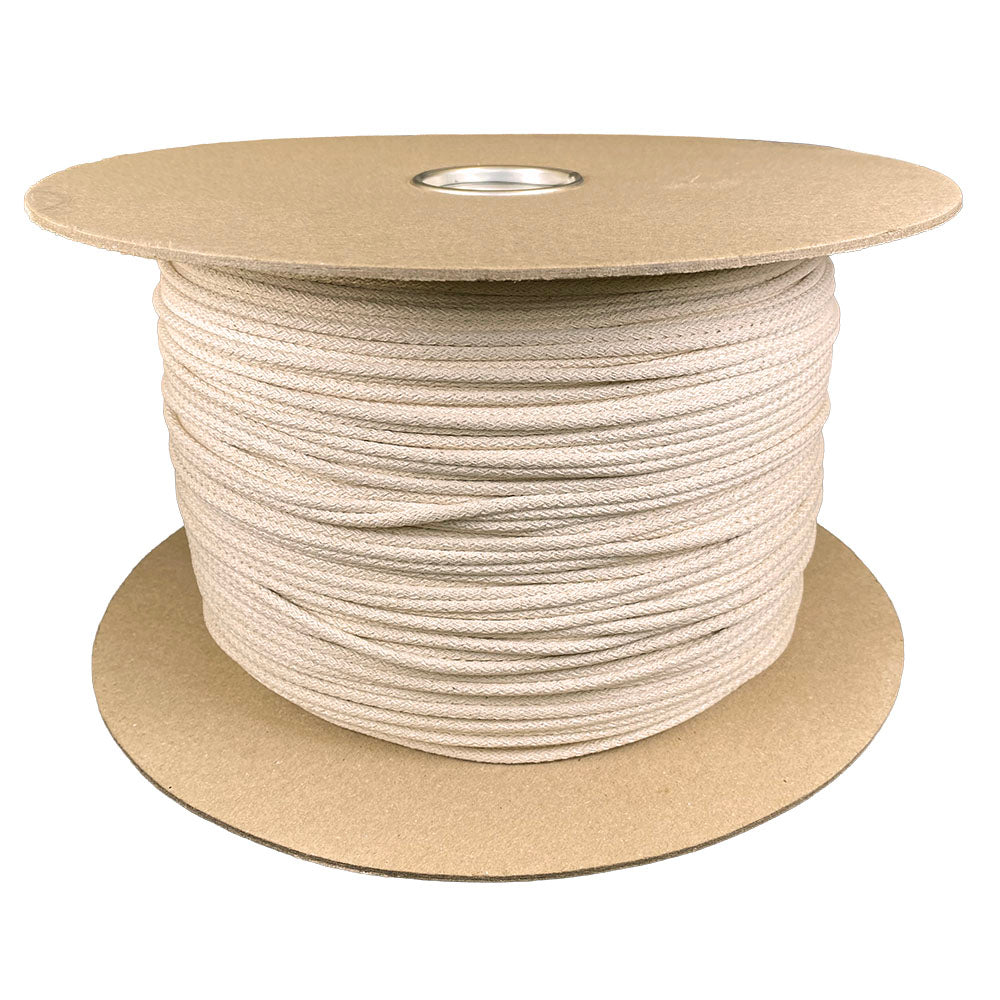spool of 4mm natural cotton cord on white background