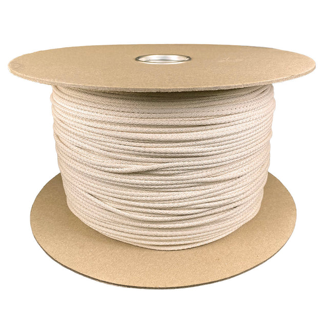 spool of 4mm natural cotton cord on white background