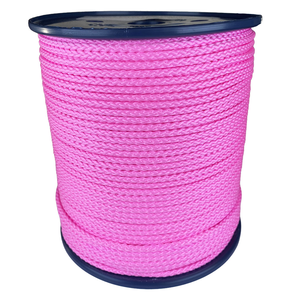 spool of 4mm pink braided cord on a plastic reel on a white background