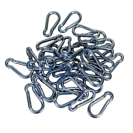 A pile of stainless steel carabiner hooks, arranged on a plain white background.