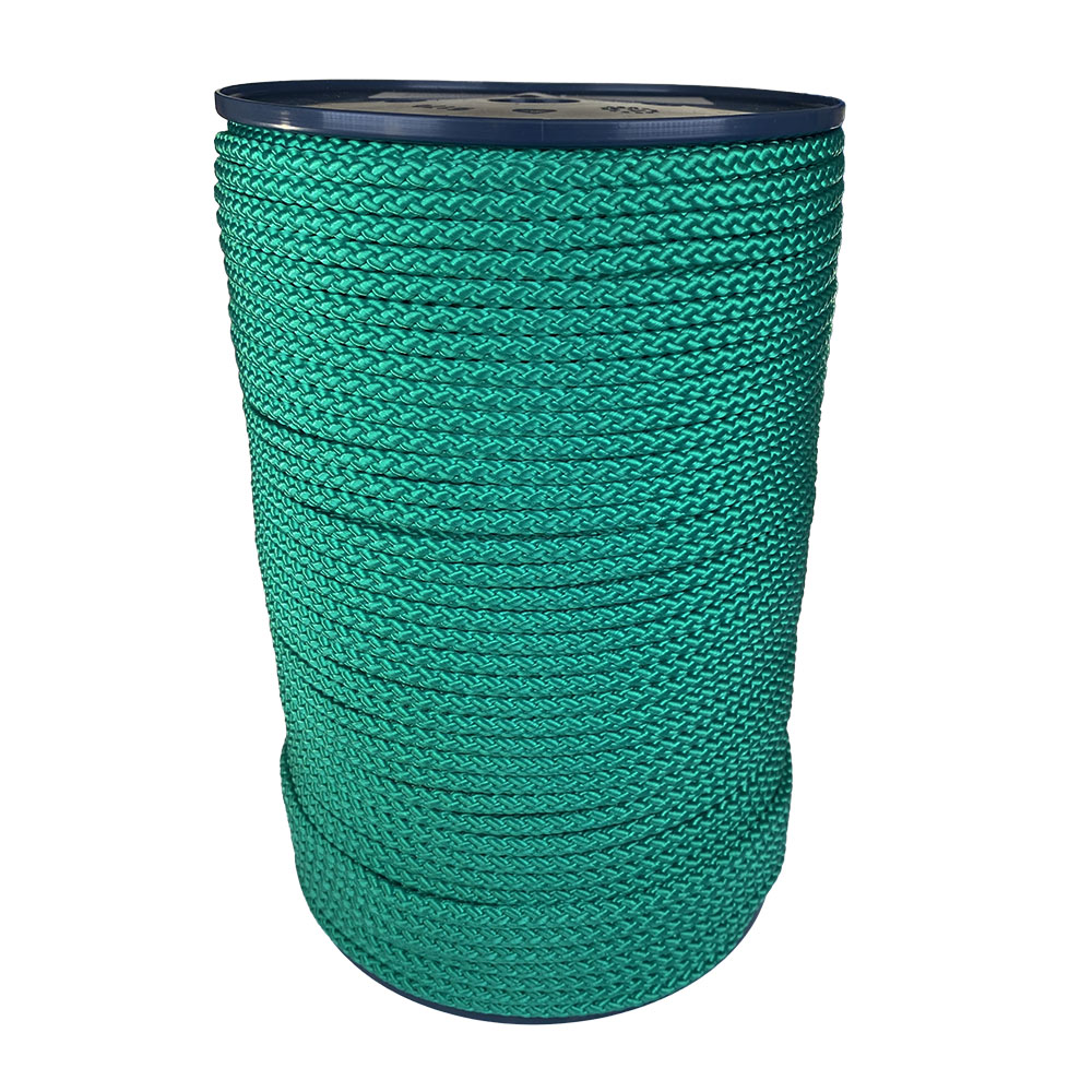 spool of 6mm green braided cord on a plastic reel on a white background