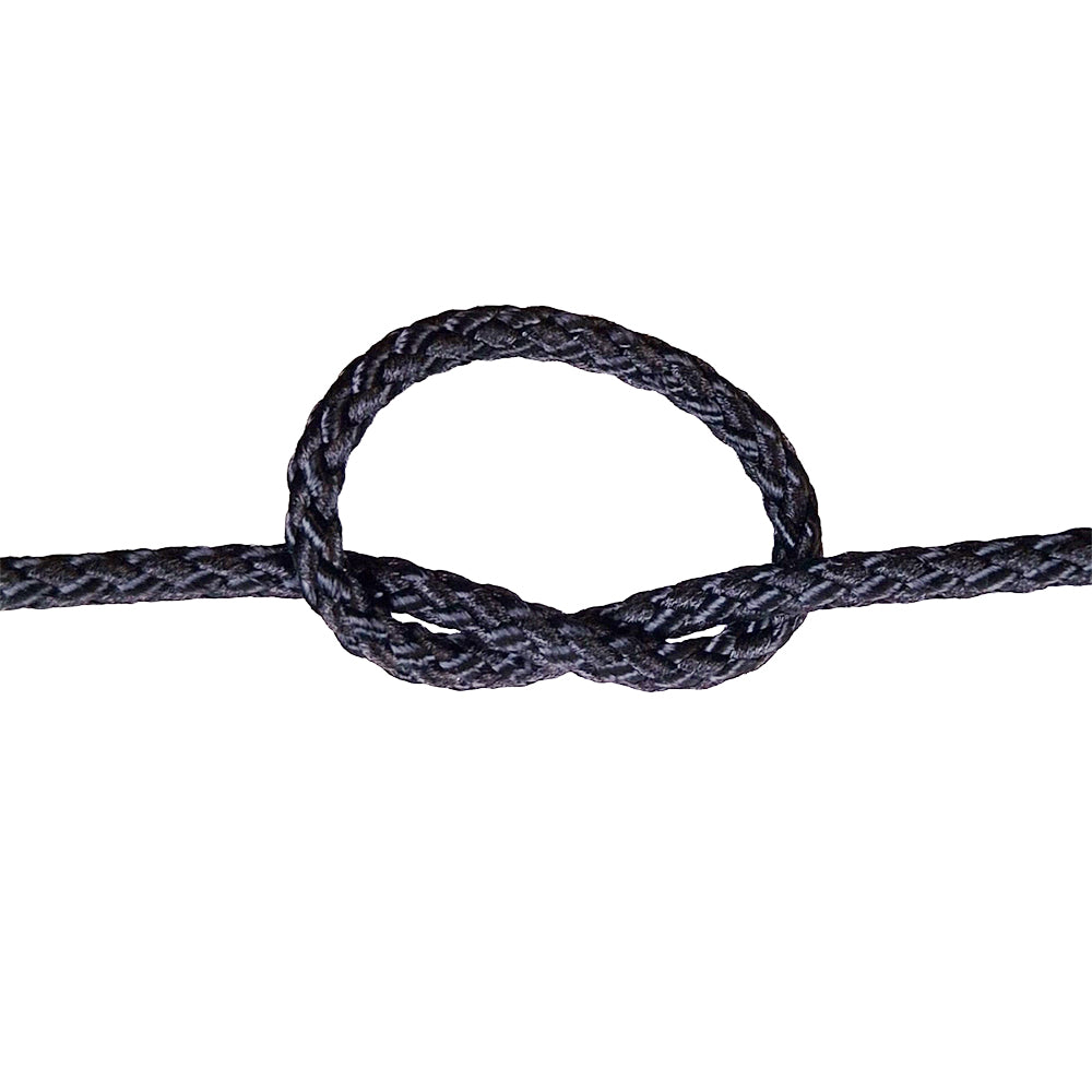 Close-up of a knotted black rope on a white background