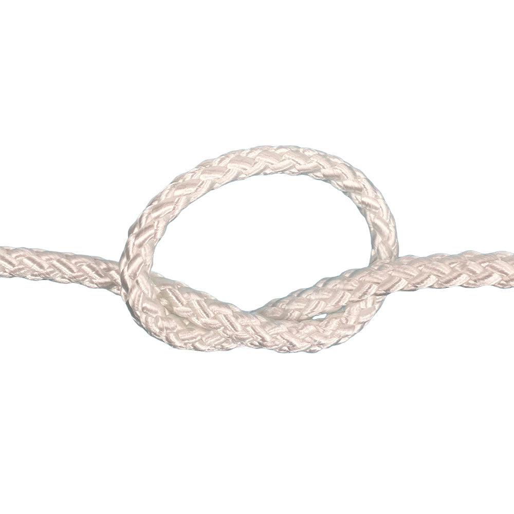 Close-up of braided white rope on a white background
