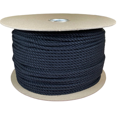 Spool of 6mm black cotton rope on a cardboard reel with a white background