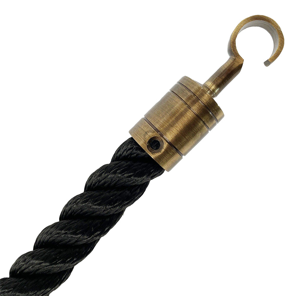 Black rope with a brass hook on a white background