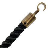 Black rope with a brass hook on a white background