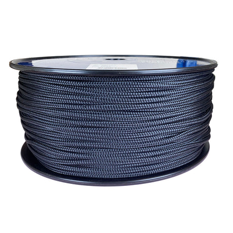 Spool of 6mm black braided polyester on a plastic spool against a white background