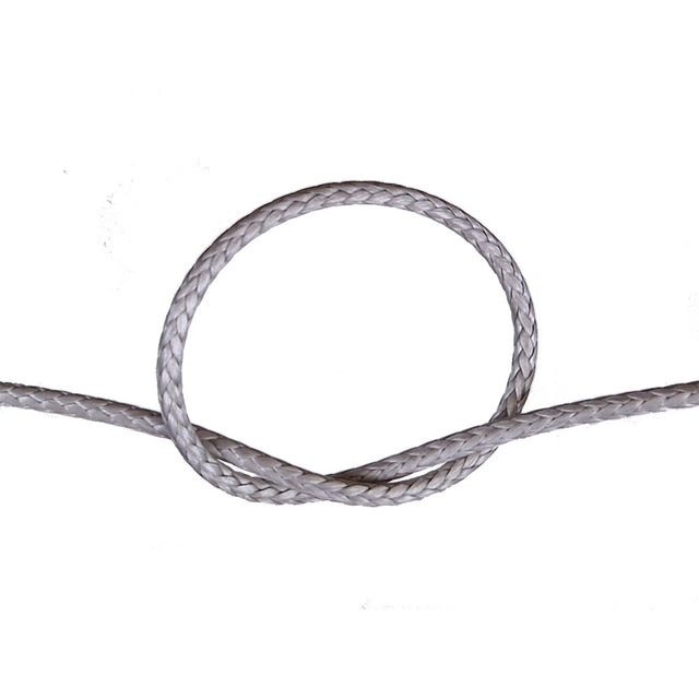 Close-up of a knotted gery compact braid rope on a white background