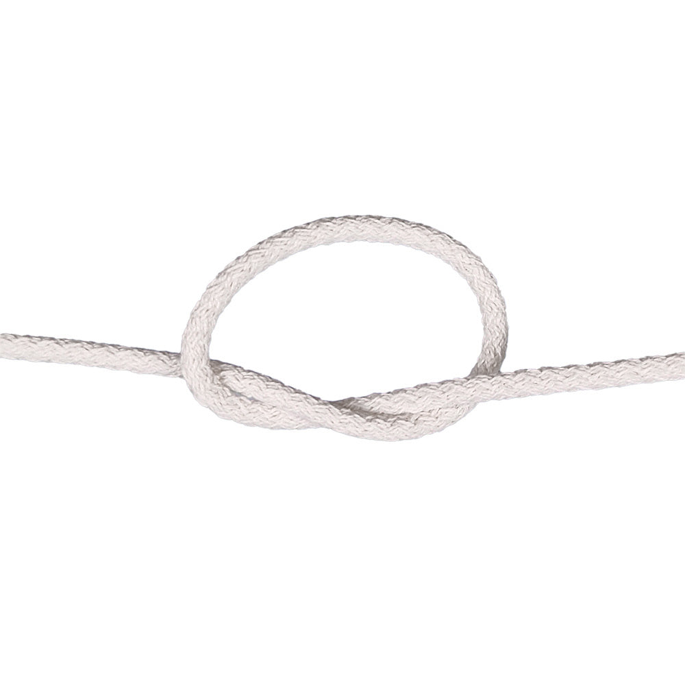 knot of braided cotton cord on a white background
