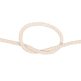 Coiled piece of natural cotton rope on a white background
