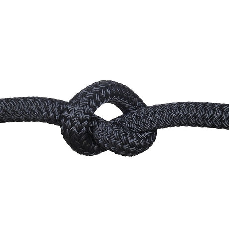 Close-up of a knot of black braided rope on a white background