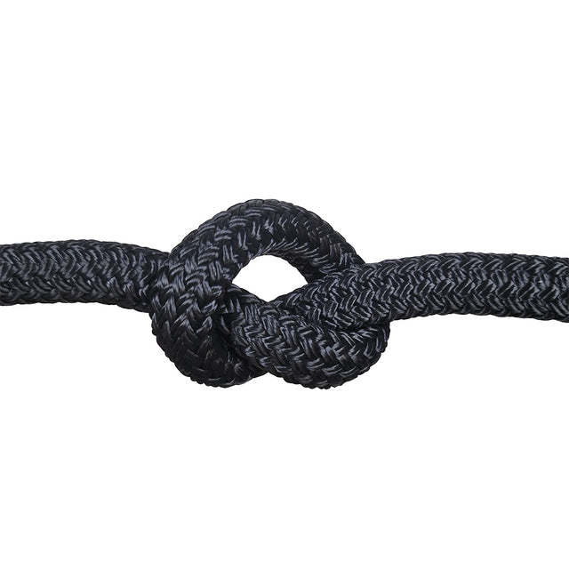 Close-up of a knot of black braided rope on a white background