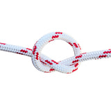 White with red fleck braided polyester rope in a knotwith a white background.