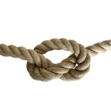 Natural brown rope in a knot on a white background
