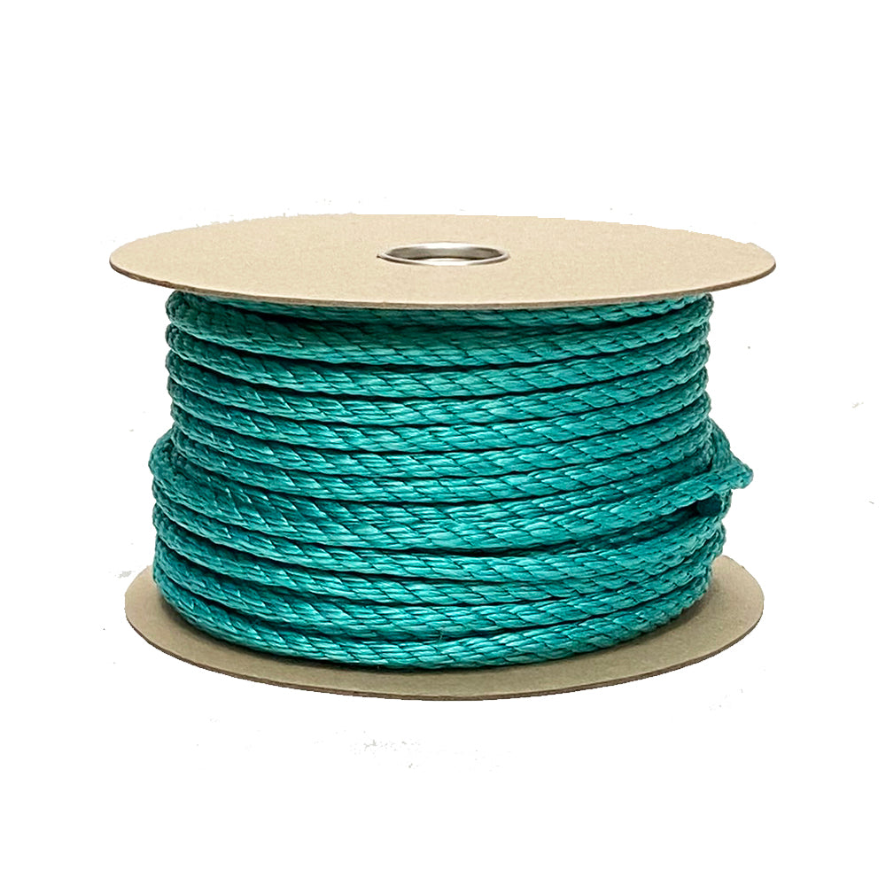 Spool of green rope on a white background