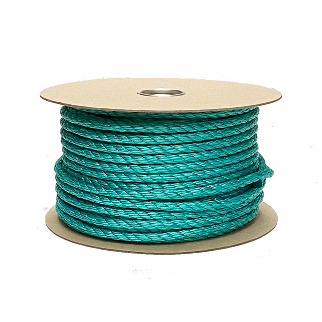 Spool of green rope on a white background