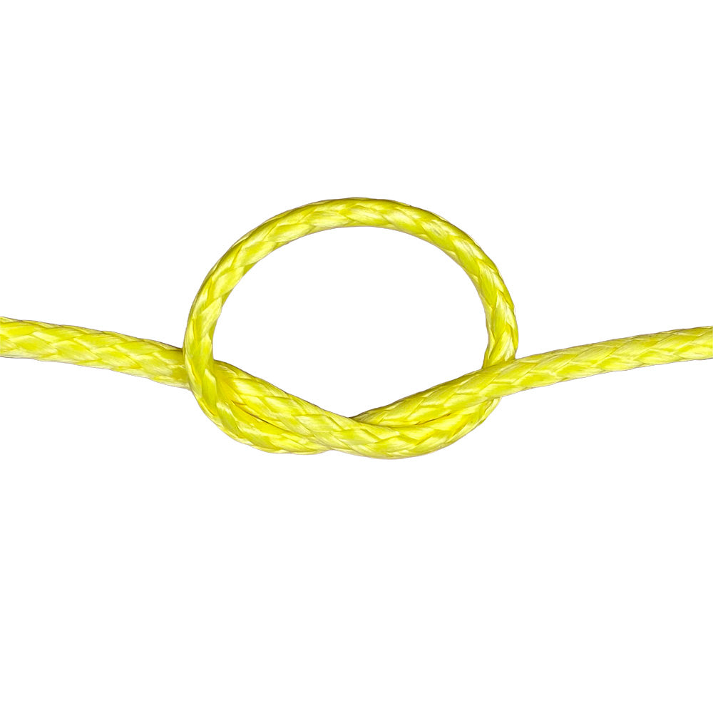 Close-up of yellow HMPE in a knot on a white background