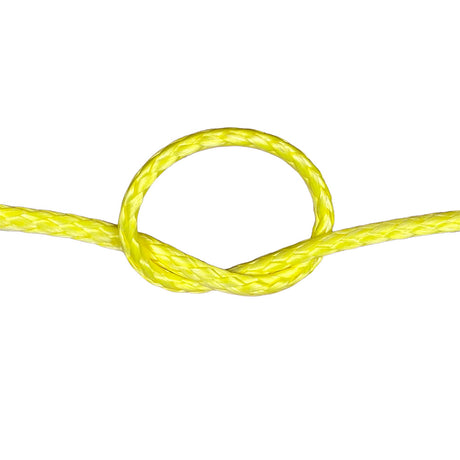 Close-up of yellow HMPE in a knot on a white background
