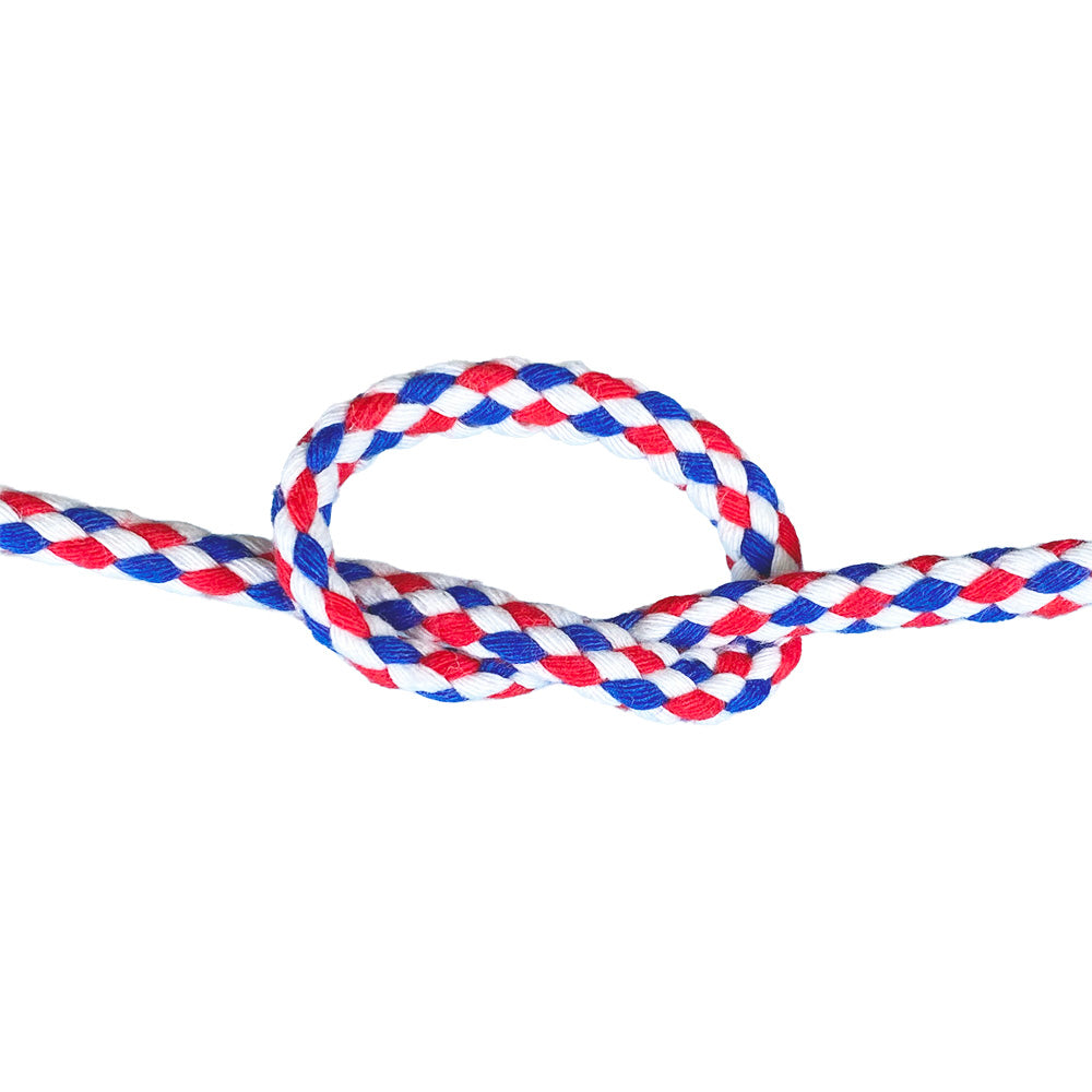 Close-up of 6mm red, white and blue magcians cord in a knot with a white background
