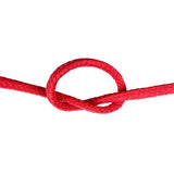 Close-up of 6mm red magcians cord in a knot with a white background