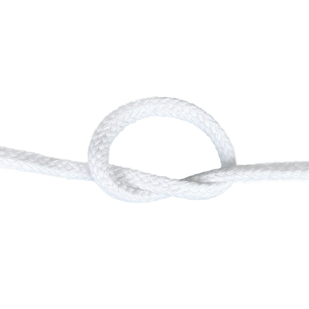 Close-up of 6mm white magcians cord in a knot with a white background