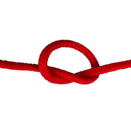 Close-up of 12mm red magcians cord in a knot with a white background