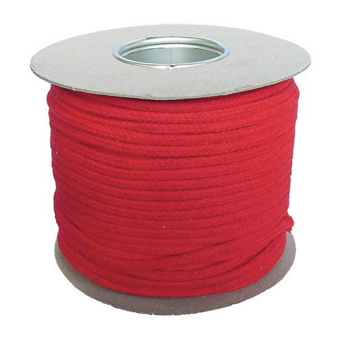 Spool of 6mm red magicians cord on a cardboard reel with a white background