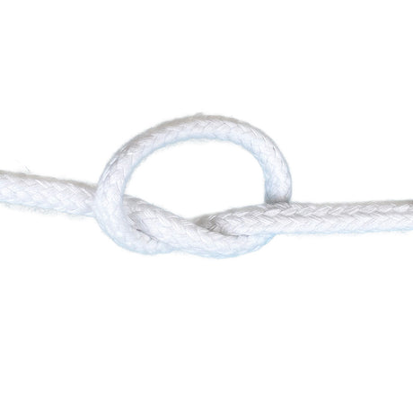 Close-up of 12mm white magcians cord in a knot with a white background