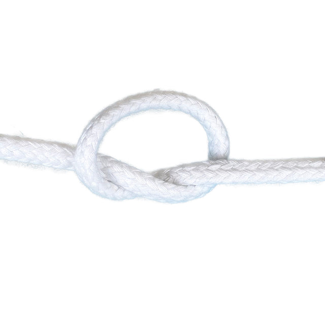 Close-up of 12mm white magcians cord in a knot with a white background