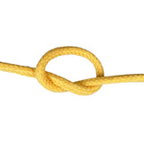 Close-up of 12mm yellow magcians cord in a knot with a white background