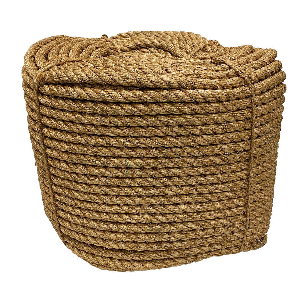 Coil of brown 18mm manila rope on a white background