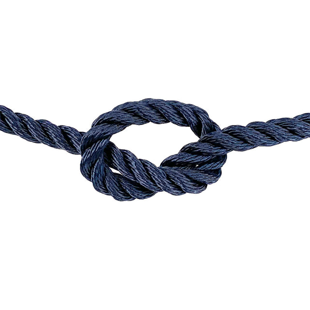 close-up of 12mm navy blue polyester rope in a knot on a white background