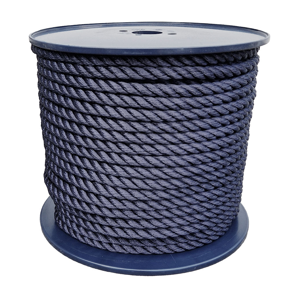 Spool of 12mm navy blue polyester rope on a white background