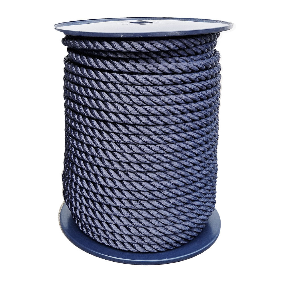 Spool of 14mm navy blue polyester rope on a white background