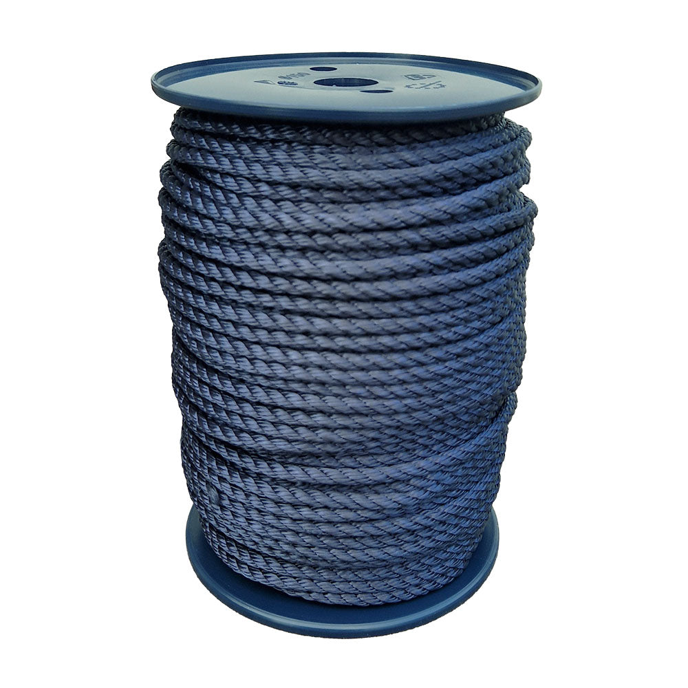 Spool of 8mm navy blue polyester rope on a white background