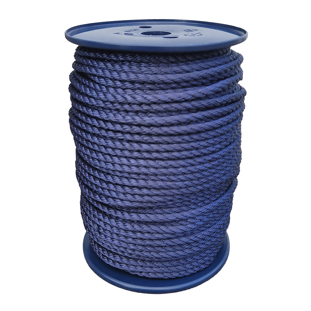Spool of 6mm navy blue yacht rope on a white background