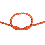 Close-up of a knotted orange rope on a white background