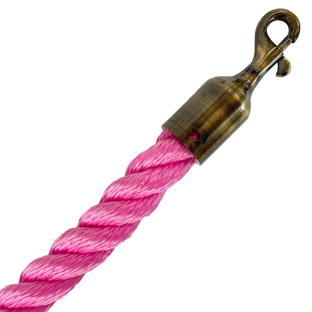 Pink rope with a brass hook on a white background