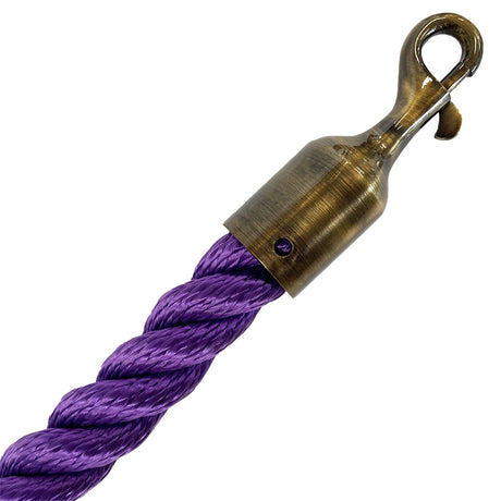 Purple rope with a brass hook on a white background