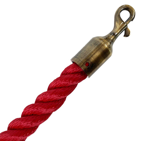 Red rope with a brass hook on a white background