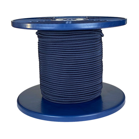 Spool of navy blue shock cord on a blue plastic reel with a white background