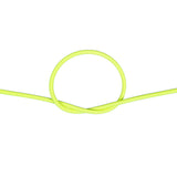 Close-up of neon yellow bungee cord in a knot on a white background